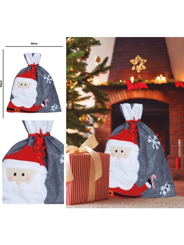 Grijze kerstman cadeauzak kerstmis