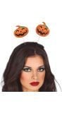 Oranje pompoen met springveren haarband halloween