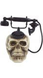 Oude telefoon met schedel